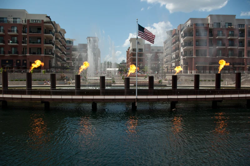 Flames and fountain jets along the Branson Landing waterfront
